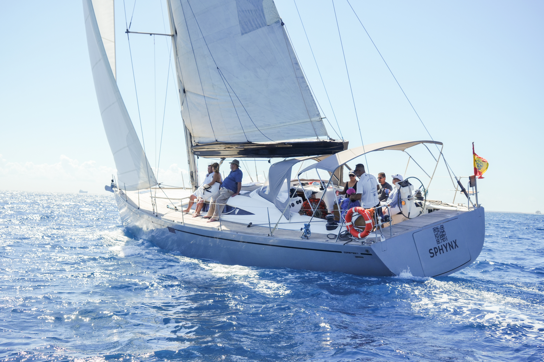 Sails up off Barcelona — on a sailing yacht the engine goes off.